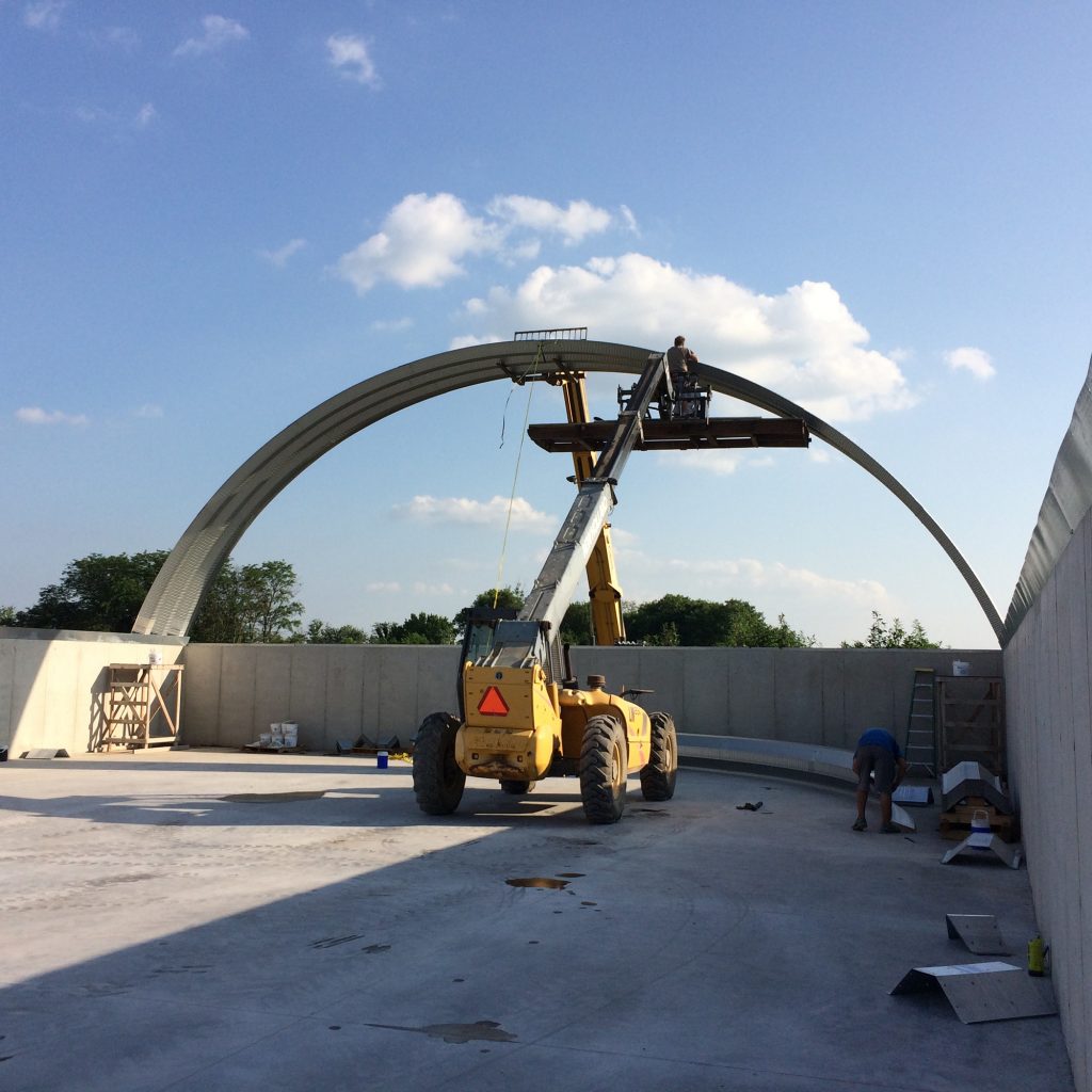 Steel roof on concrete wall