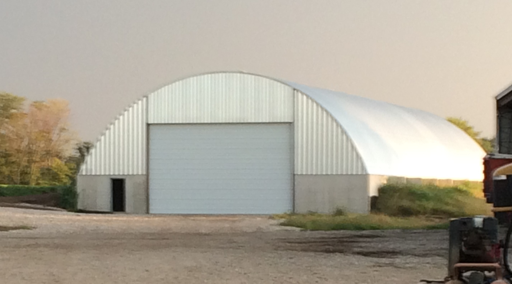 Quonset hut steel building on wall