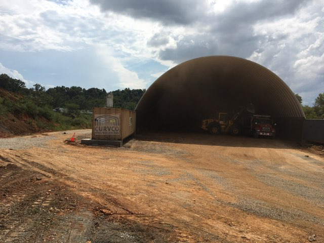 Claiborne Hauling LLC, 70'x120' Metal Roof Between Two Shipping Containers